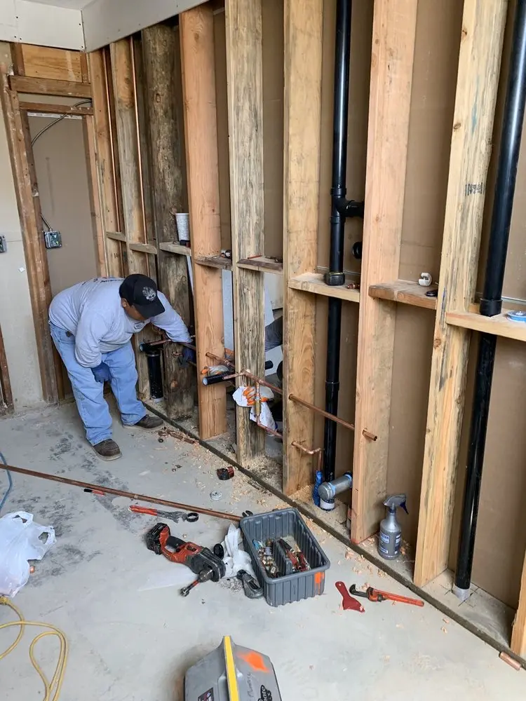 Commercial rough-in plumbing for Water Heater Replacement in Candler Park